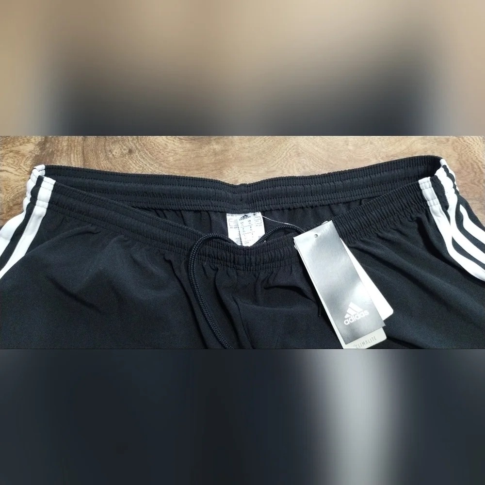 Adidas Black and White Athletic Shorts with Iconic Stripes